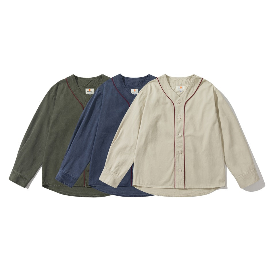 Three long-sleeve button-front shirts shown from the front in olive green, navy, and cream, each with burgundy piping.