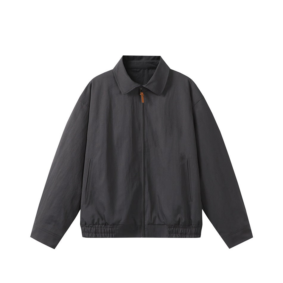 Dark gray zip-front jacket with a turn-down collar, slanted pockets and an elastic hem, flat lay front view