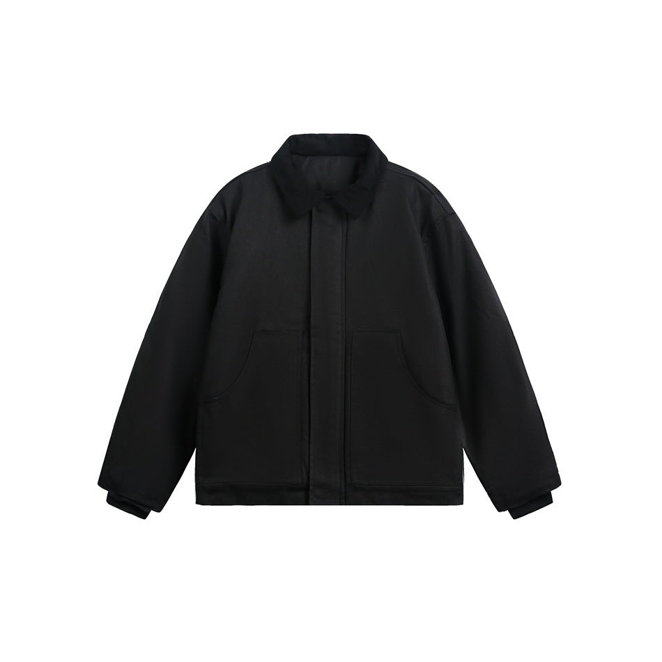 Black work-style jacket with corduroy-look collar, front placket and two large patch pockets, flat lay