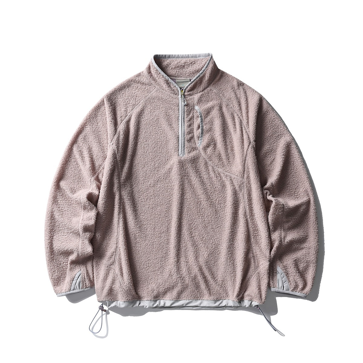Dusty pink textured fleece-like half-zip pullover with light gray trim and drawstring hem, flat lay front view