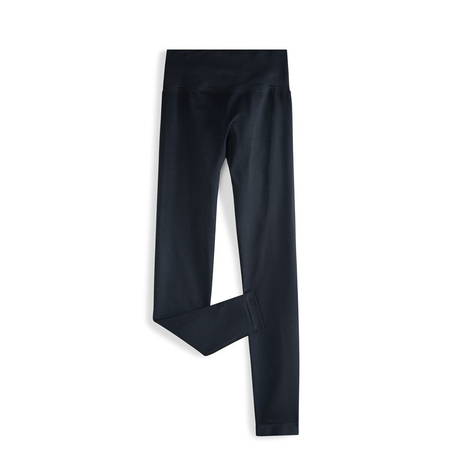 Black high-waisted ankle-length leggings laid flat with one leg folded