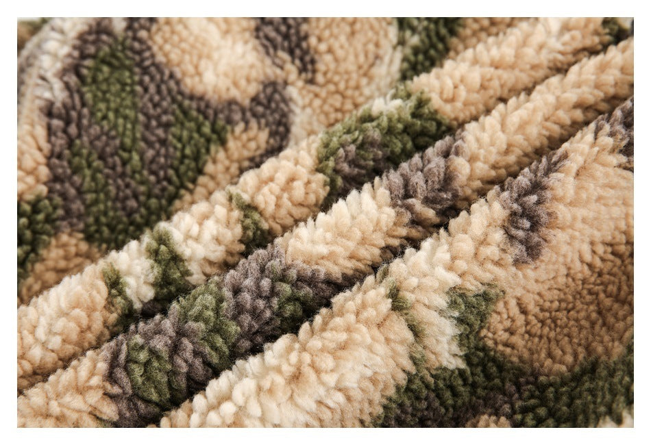 Close-up showing the thick, textured beige, olive green, and gray camouflage fleece.
