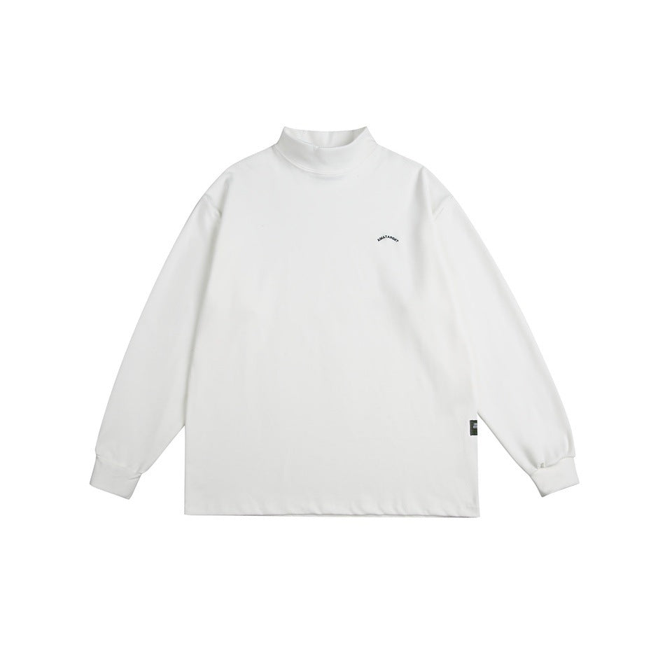 White mock-neck long-sleeve top flat lay, front view, with small arched chest print and ribbed cuffs