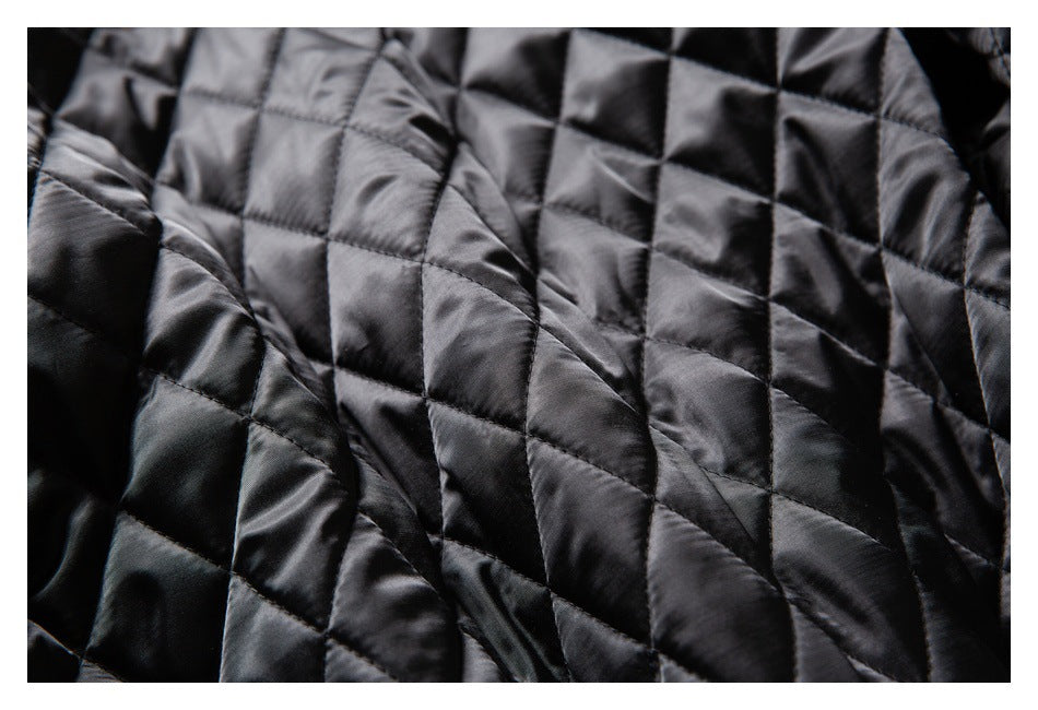 Close-up of the coat's black diamond-quilted lining.