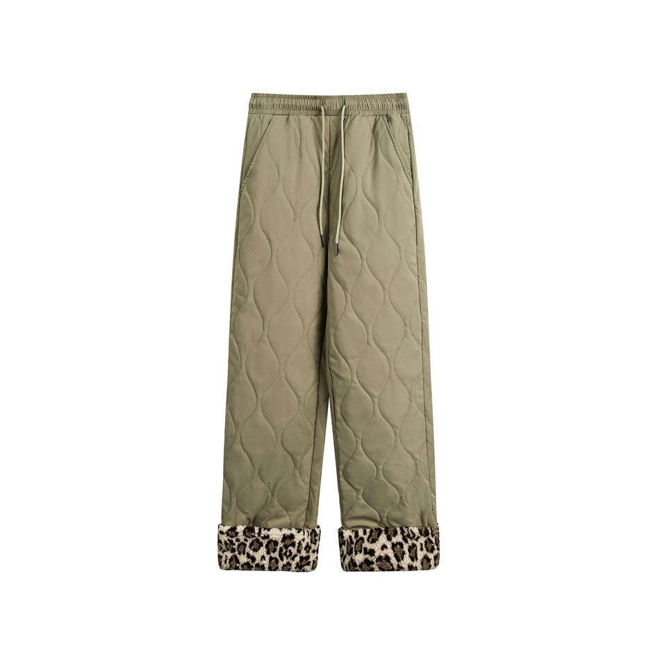 Green quilted drawstring pants with brown and cream leopard-print fleece-like turned-up cuffs, flat front view