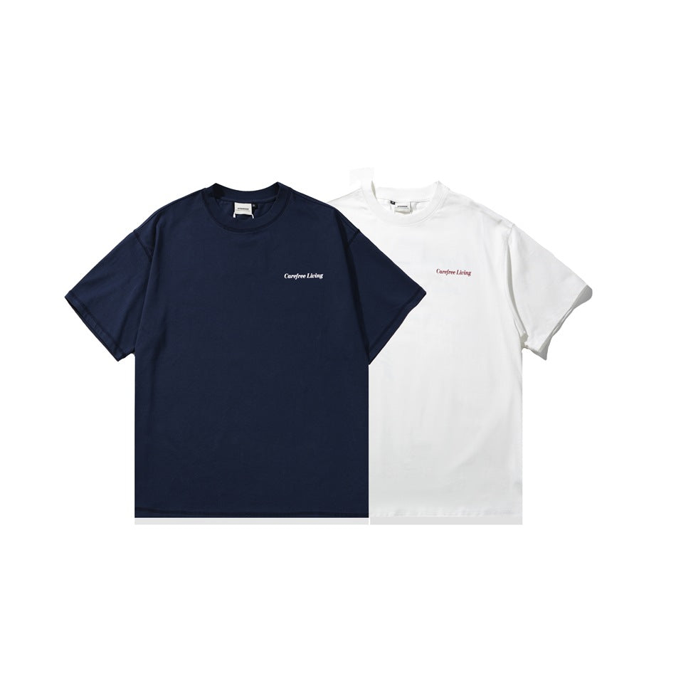 Two short-sleeve T-shirts shown side by side, one navy and one white, each with small chest lettering.