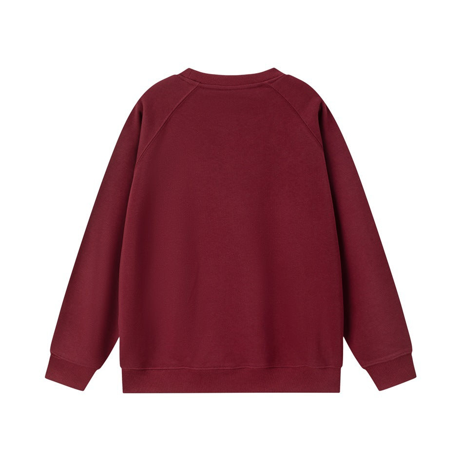 Back view of a plain burgundy raglan sleeve crew neck sweatshirt with ribbed cuffs and hem