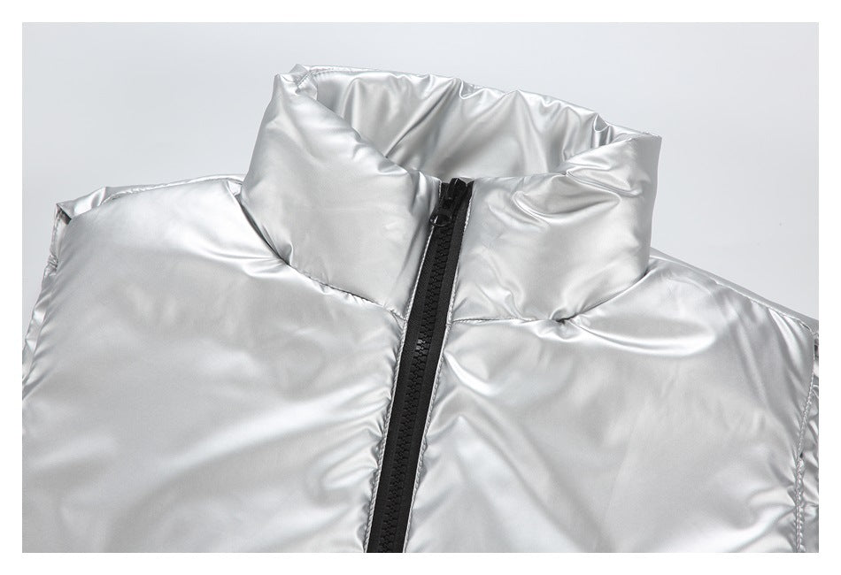 Close-up of a shiny silver high collar and black front zipper on outerwear.