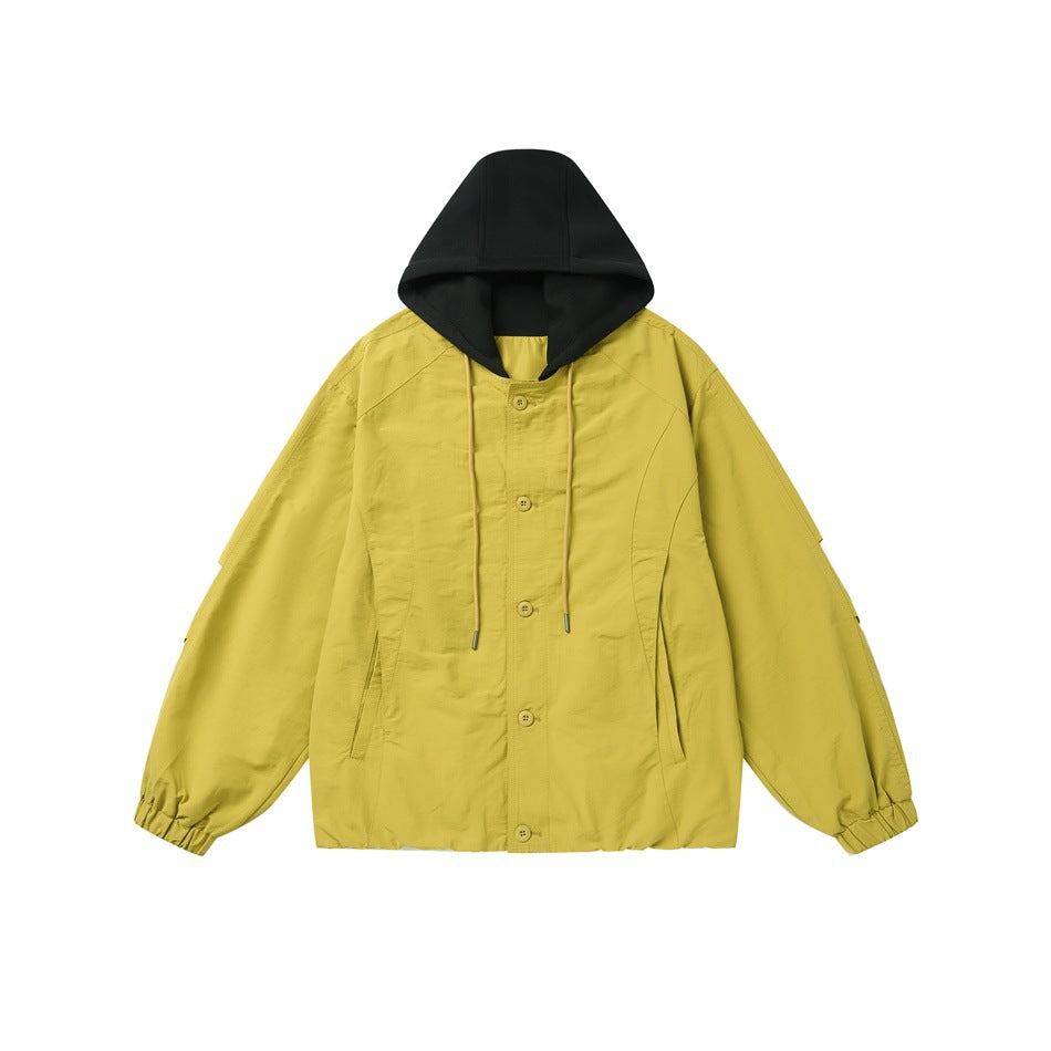Front view of a yellow button-front jacket with a black hood, drawstrings, side pockets, and gathered cuffs.