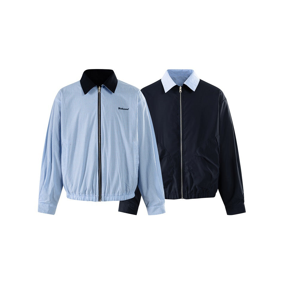 Reversible zip jacket shown both ways: light blue micro-check with navy collar and navy side with light blue collar