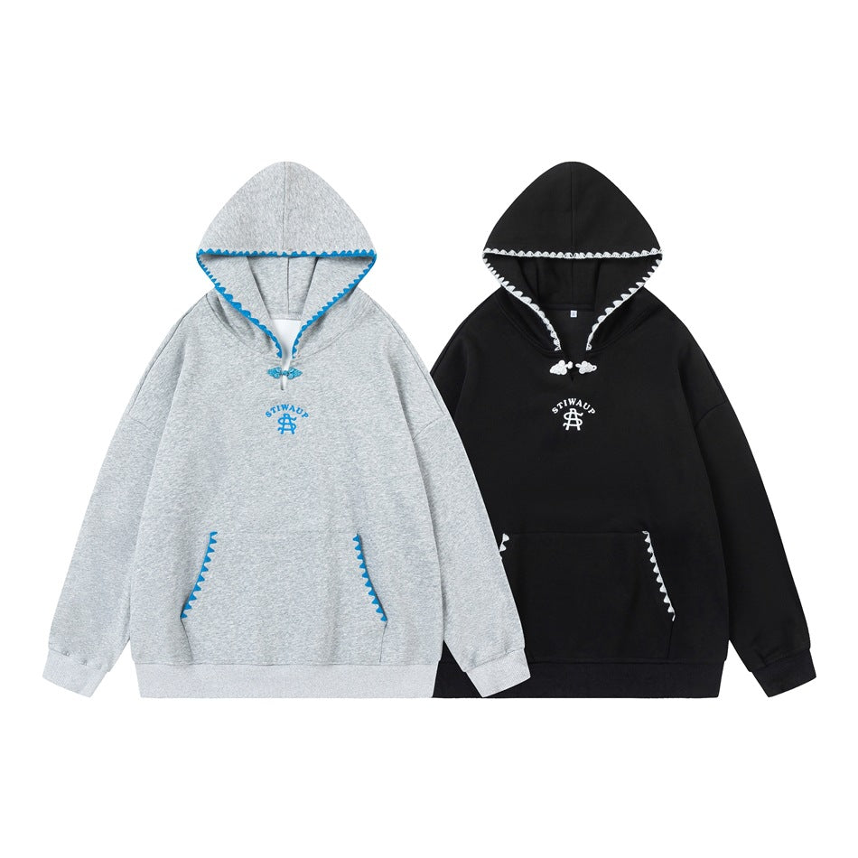 Two hoodies shown from the front: one heather gray with blue trim and one black with white trim.