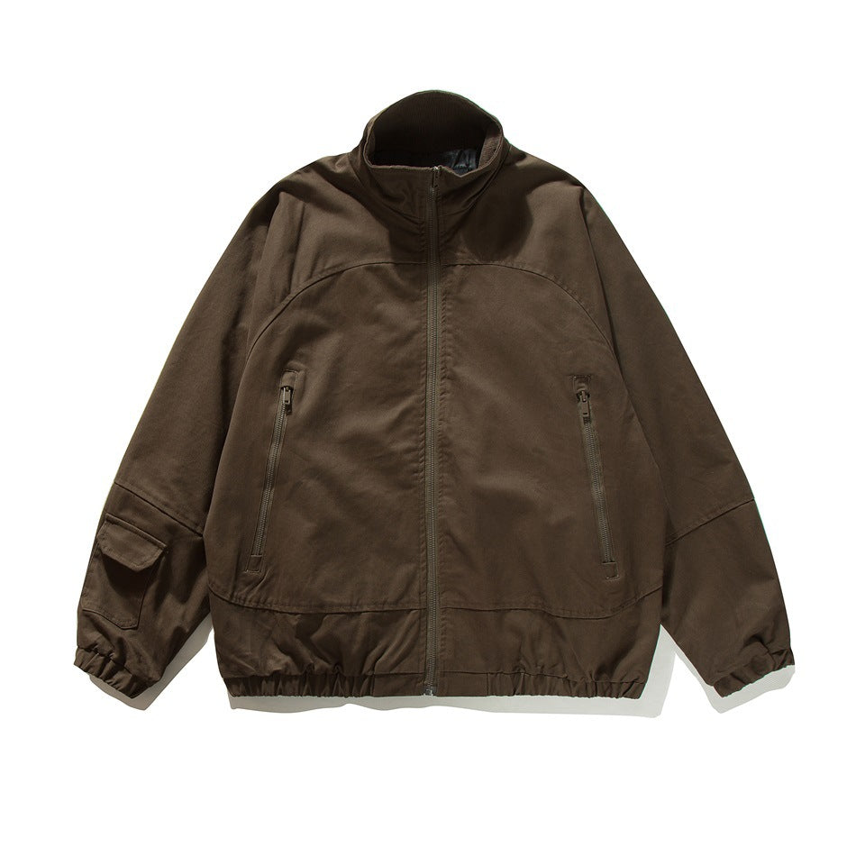 Coffee brown stand-collar zip jacket flat lay with zippered chest pockets, sleeve flap pocket and elastic hem
