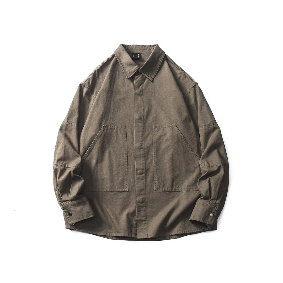Olive-brown button-front shirt flat lay with large patch pockets, pointed collar and snap cuffs