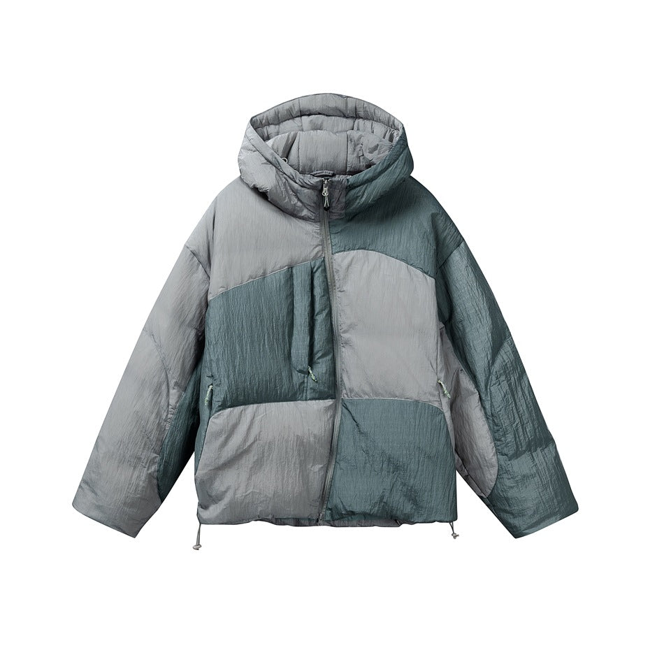 Hooded puffer jacket in light gray and muted teal-green color-block panels with diagonal front zip, flat view