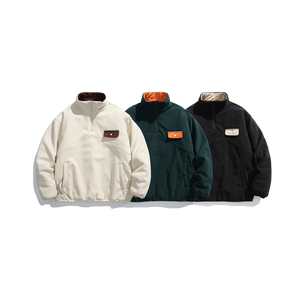 Three quarter-zip pullovers shown together in ivory, dark green, and black, each with a contrasting chest pocket.
