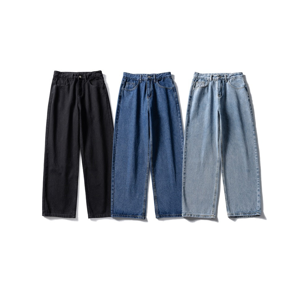 Three pairs of wide-leg jeans shown from the front in black, dark blue, and light blue.