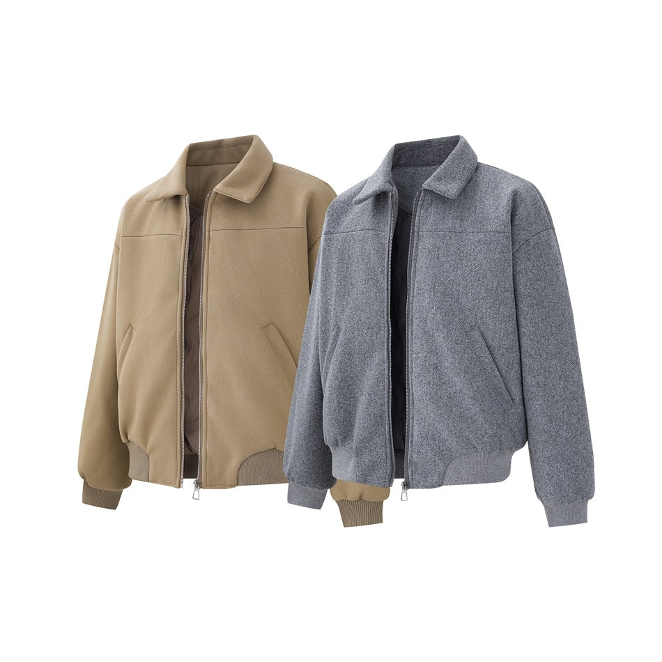Tan and gray zip-front jackets with pointed collars, slanted pockets, and ribbed cuffs and hems.