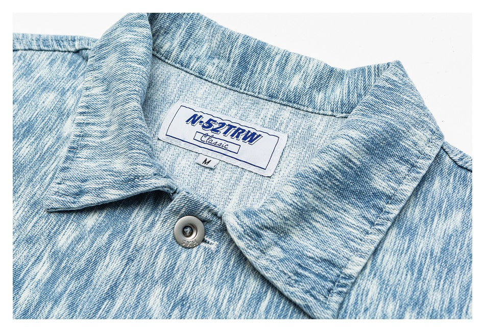 Close-up of the jacket collar, top button, and sewn-in label reading N.5TRW Classic.