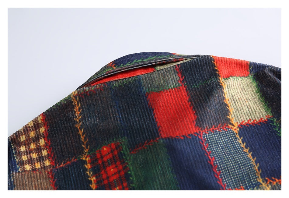 Close-up of the garment's collar and shoulder, showing multicolor patchwork and ribbed texture.