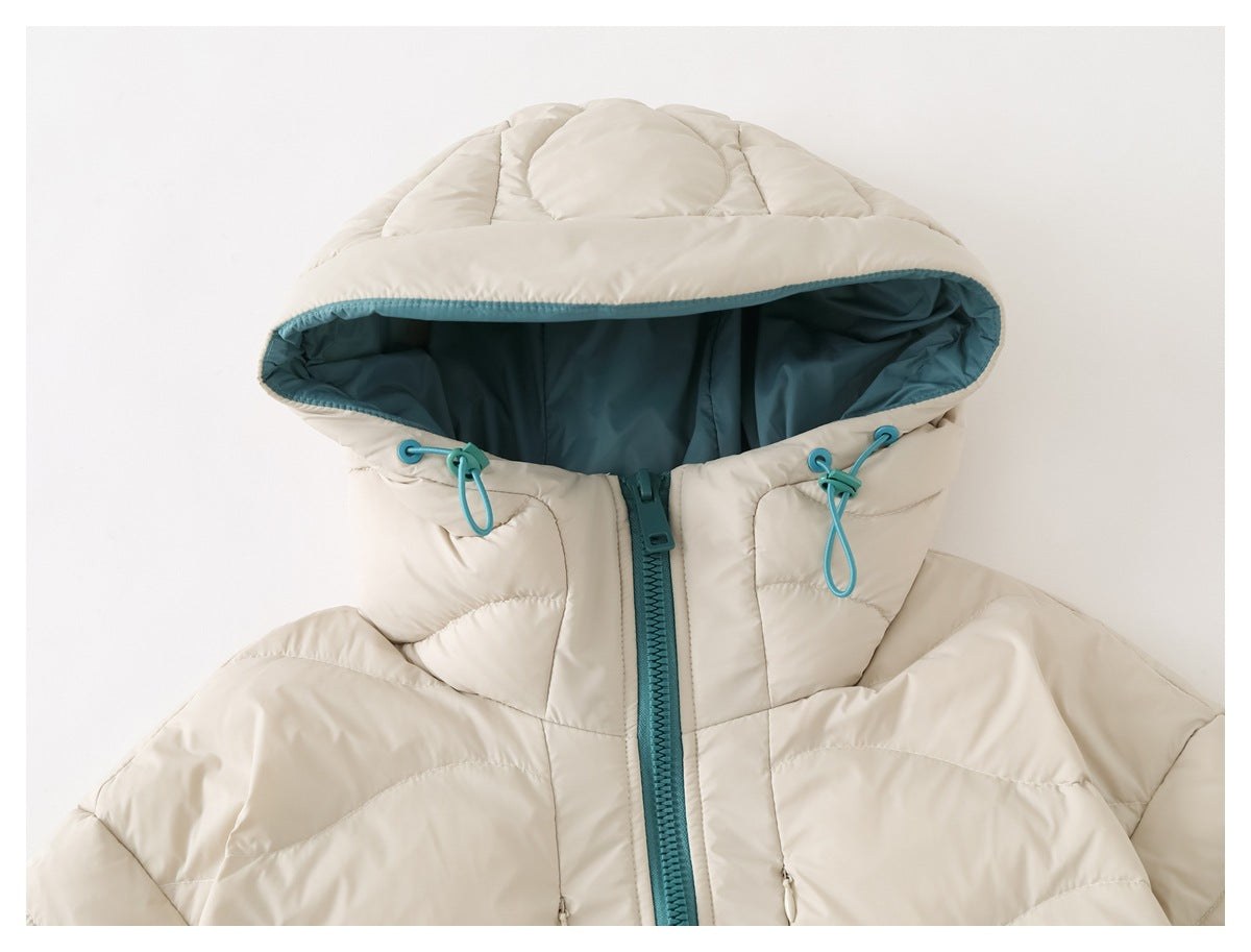 Front view of an ivory quilted jacket with a teal-lined hood, teal drawcords, and a teal zipper.