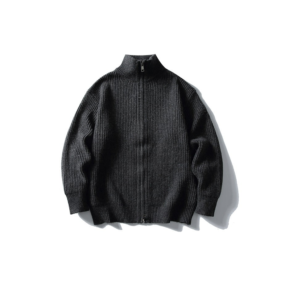 Black ribbed knit full-zip sweater with funnel collar, flat lay front view