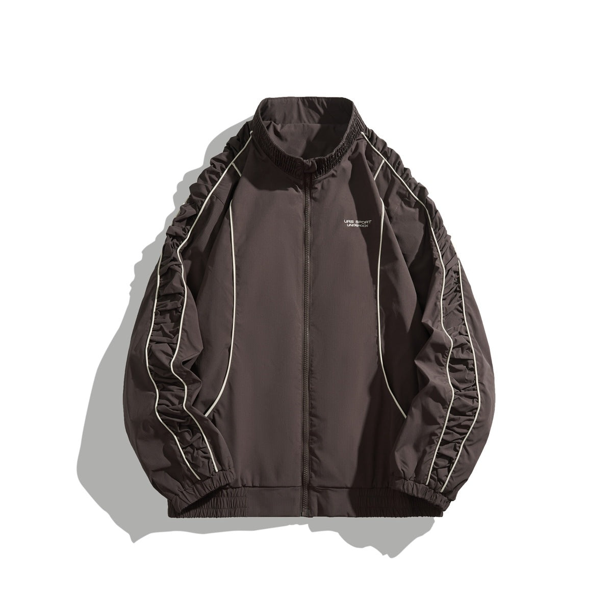Dark gray-brown stand-collar zip jacket with ruched raglan sleeves and cream piping, front view on white background