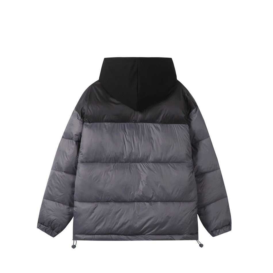 Back of a charcoal-gray puffer jacket with a black upper panel and hood, shown flat against white.