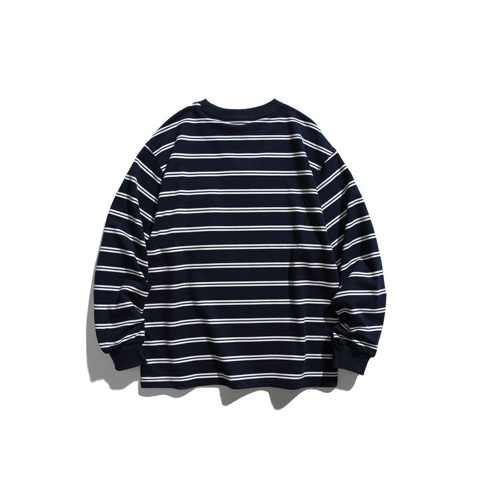 Back view of navy long-sleeve striped sweatshirt with white double stripes and ribbed collar and cuffs, flat lay