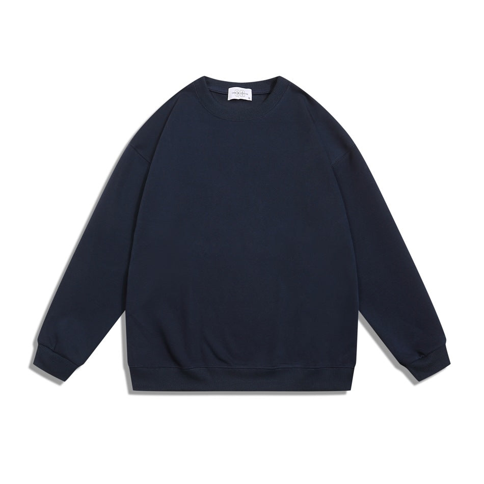 Navy crew neck sweatshirt flat lay, front view, with ribbed collar, cuffs and hem