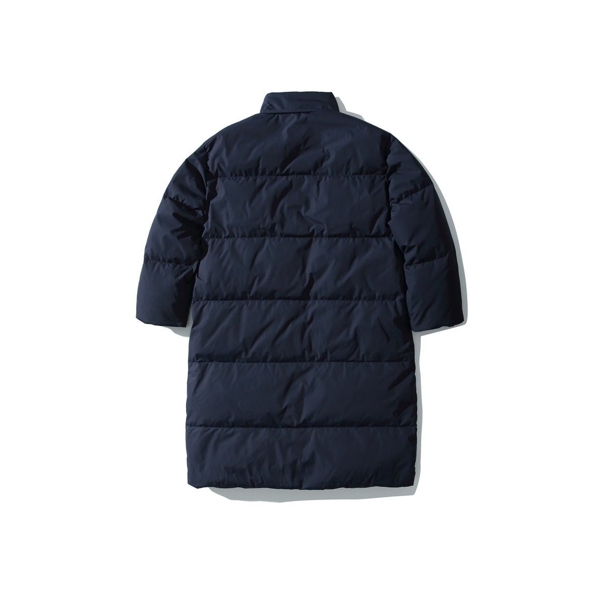Back view of a long dark navy quilted coat with horizontal stitched panels and a high collar.