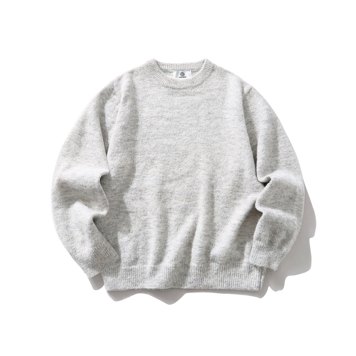 Light gray heathered crewneck sweater with ribbed collar, cuffs and hem, flat lay front view