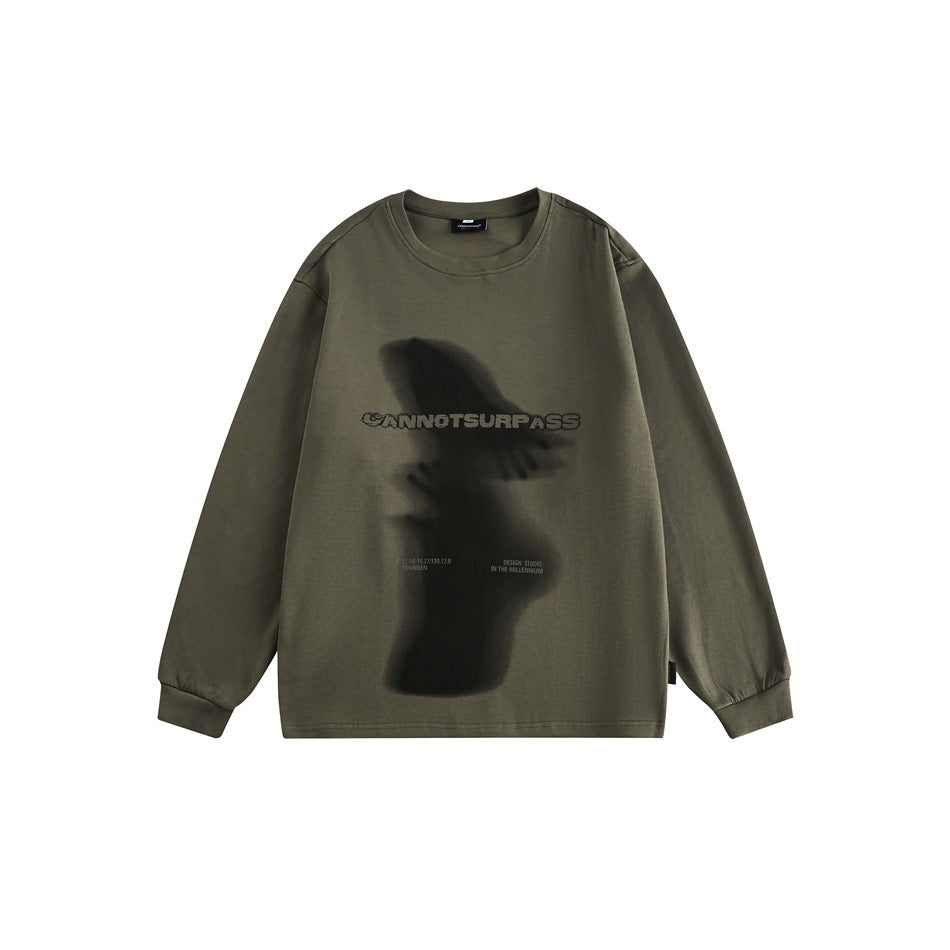 Gray-green long-sleeve crew-neck sweatshirt with blurred dark silhouette graphic and CANNOTSURPASS print, flat front view