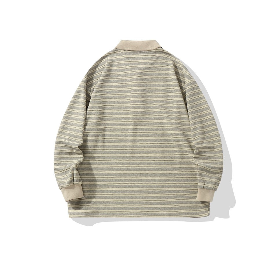 Back flat lay of a gray and khaki striped long-sleeve polo top with khaki collar and ribbed cuffs