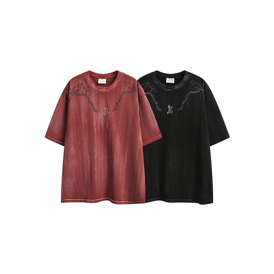 Two short-sleeve graphic T-shirts shown side by side in faded red and black.