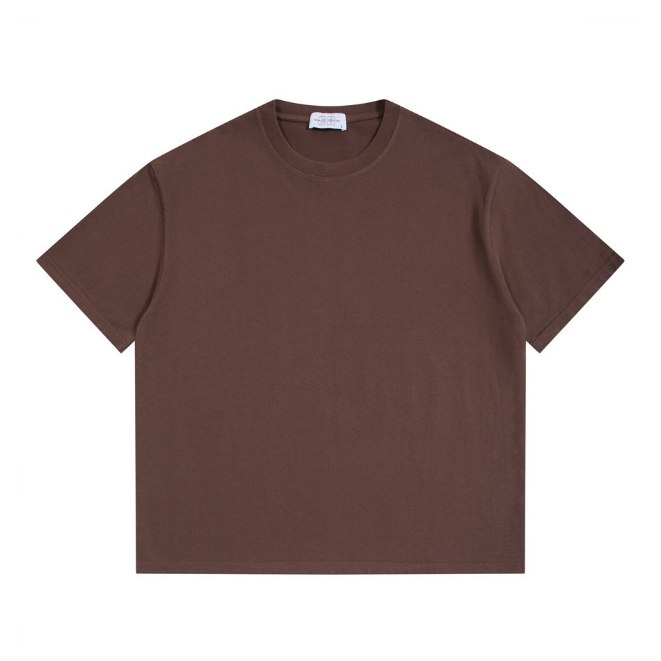 Brown short-sleeve crew neck T-shirt laid flat, front view, with a small neck label
