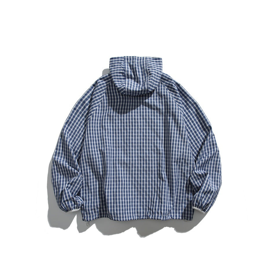 Back view of blue and white check hooded jacket flat lay with raglan sleeves and drawcord hem
