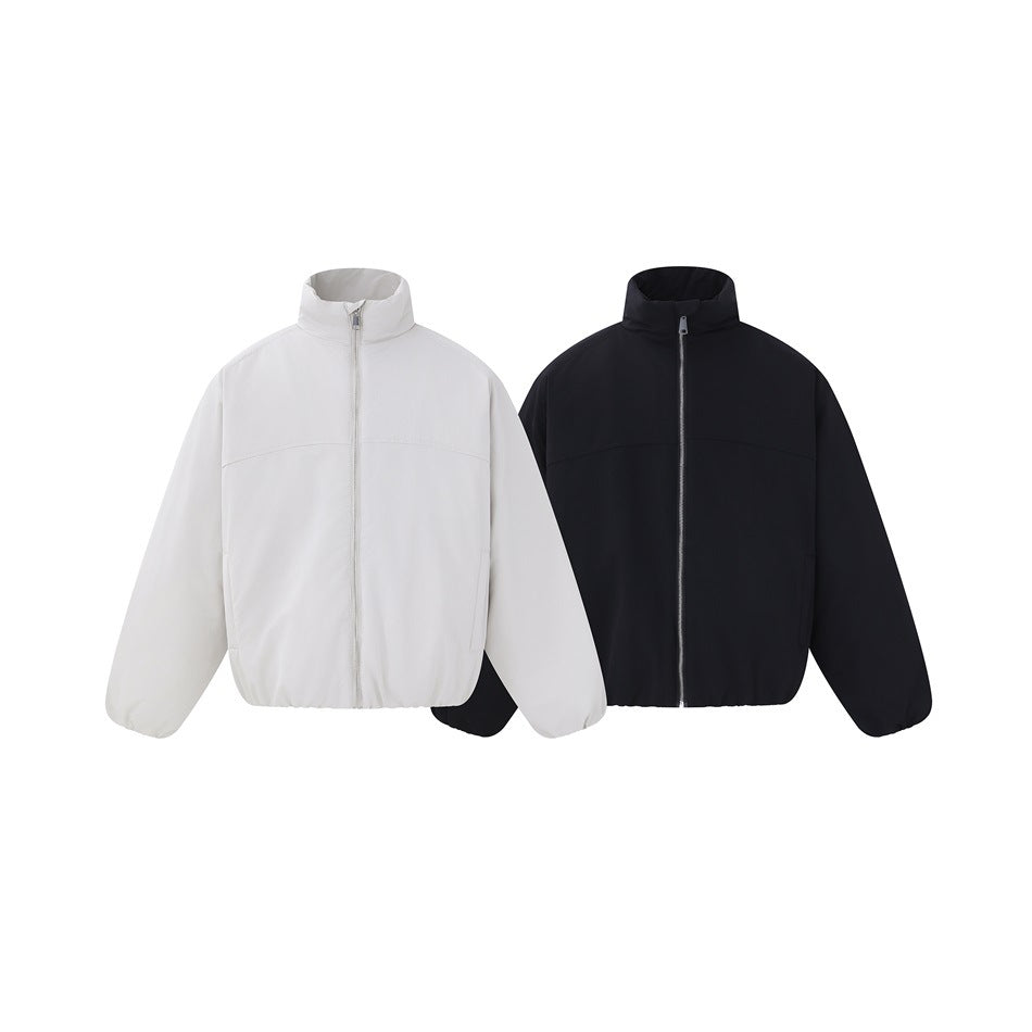 Light gray and black stand-collar zip jackets shown side by side from the front on a white background