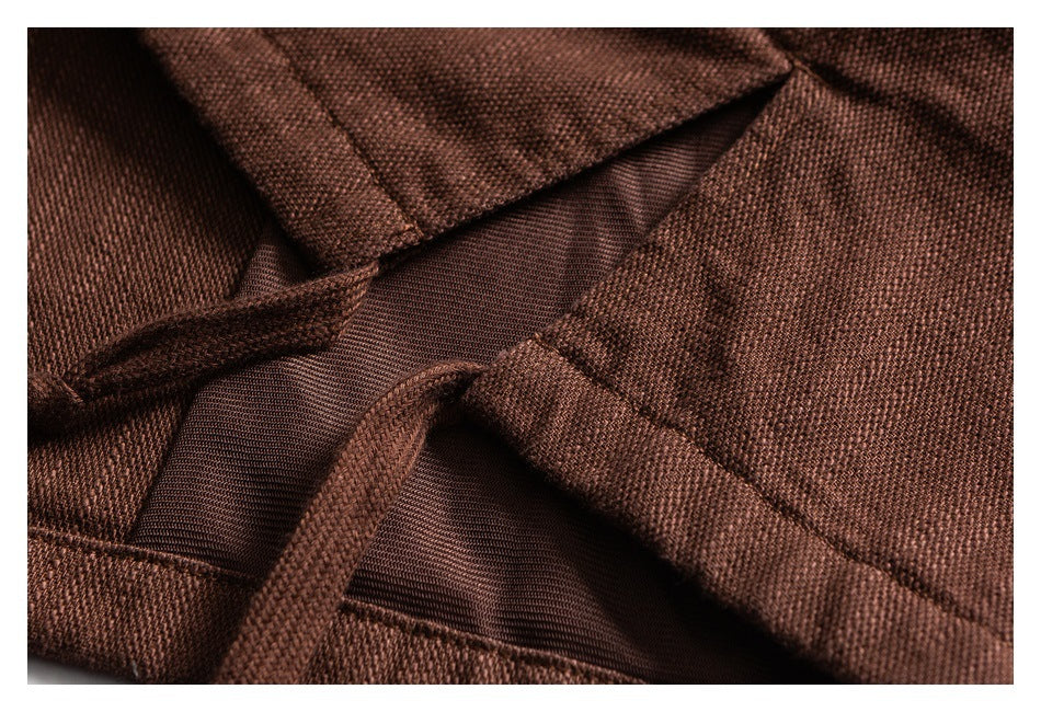 Close-up of brown garment seams and inner fabric construction.