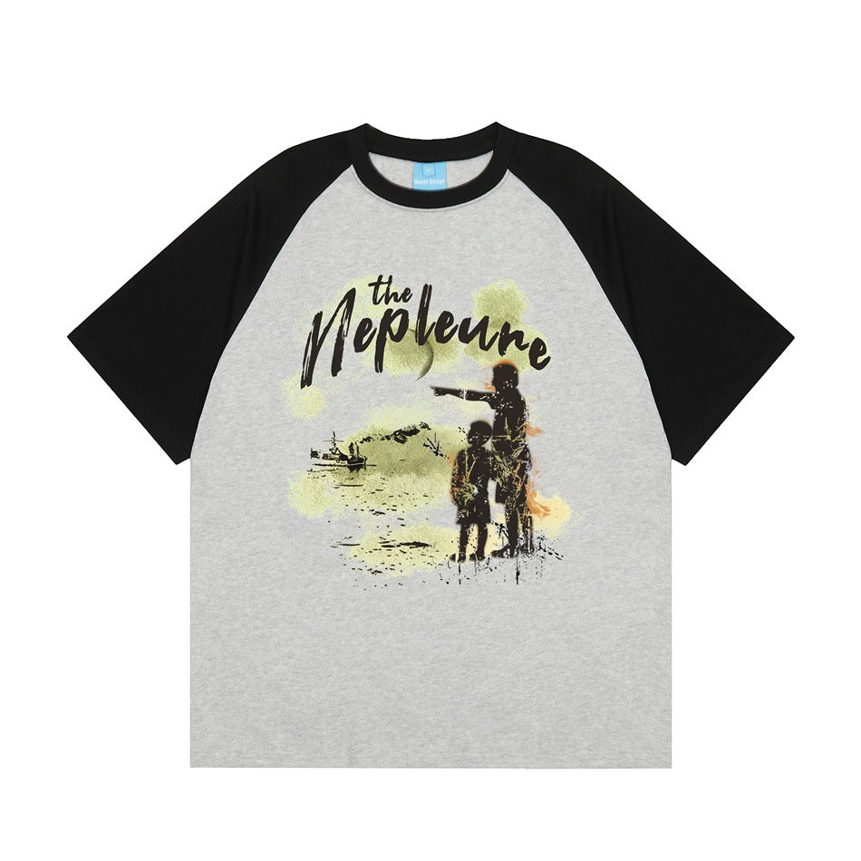 Gray and black raglan short-sleeve T-shirt with a front graphic of two child silhouettes and script text