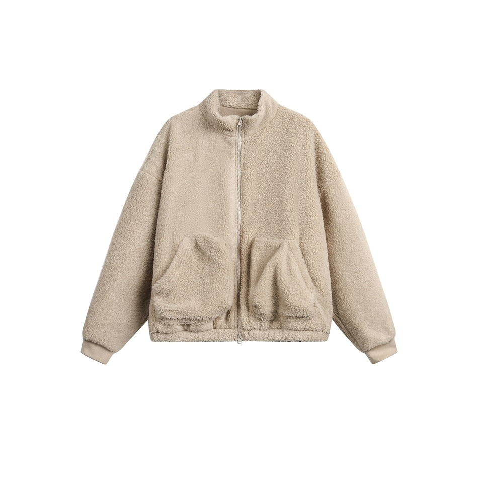 Apricot-beige fleece-like stand-collar zip jacket with two large front pockets and ribbed cuffs, flat front view