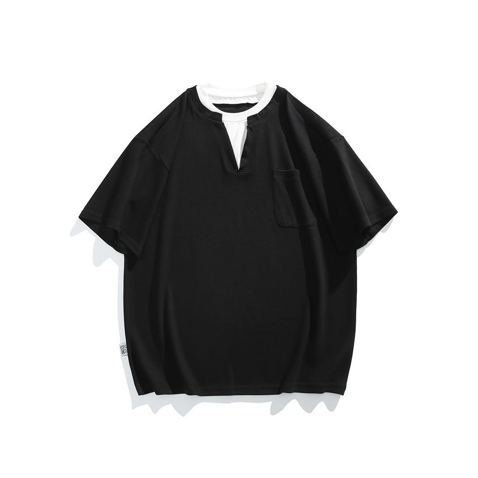 Black short-sleeve T-shirt with notched V-neck, white inner collar layer and chest pocket, flat lay