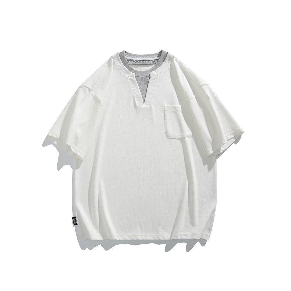 White short-sleeve T-shirt with notched V-neck, gray inner collar layer and chest pocket, flat lay