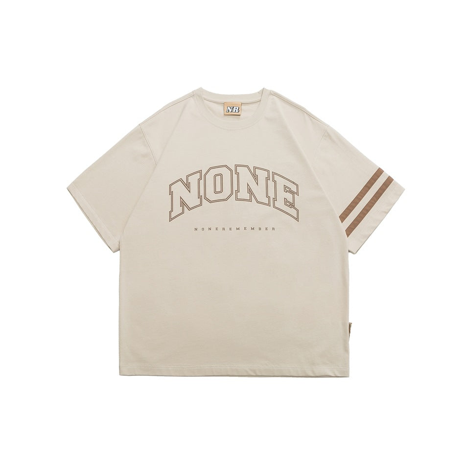 Apricot short-sleeve T-shirt with arched NONE graphic and two brown stripes on the sleeve, flat front view