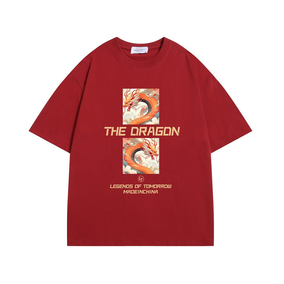 Red short-sleeve T-shirt with orange dragon illustration and 'THE DRAGON' lettering on the front