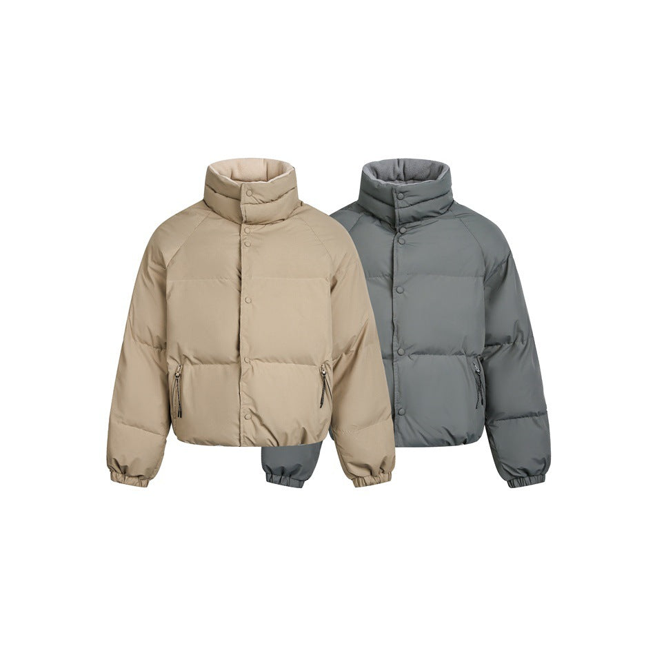 Two puffer jackets shown side by side: one beige and one blue-gray, both with high collars, snap fronts, and zip pockets.