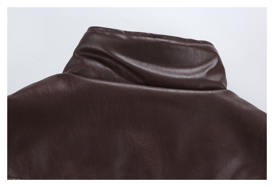 Cropped view of the dark brown jacket's back and raised collar against a light background.