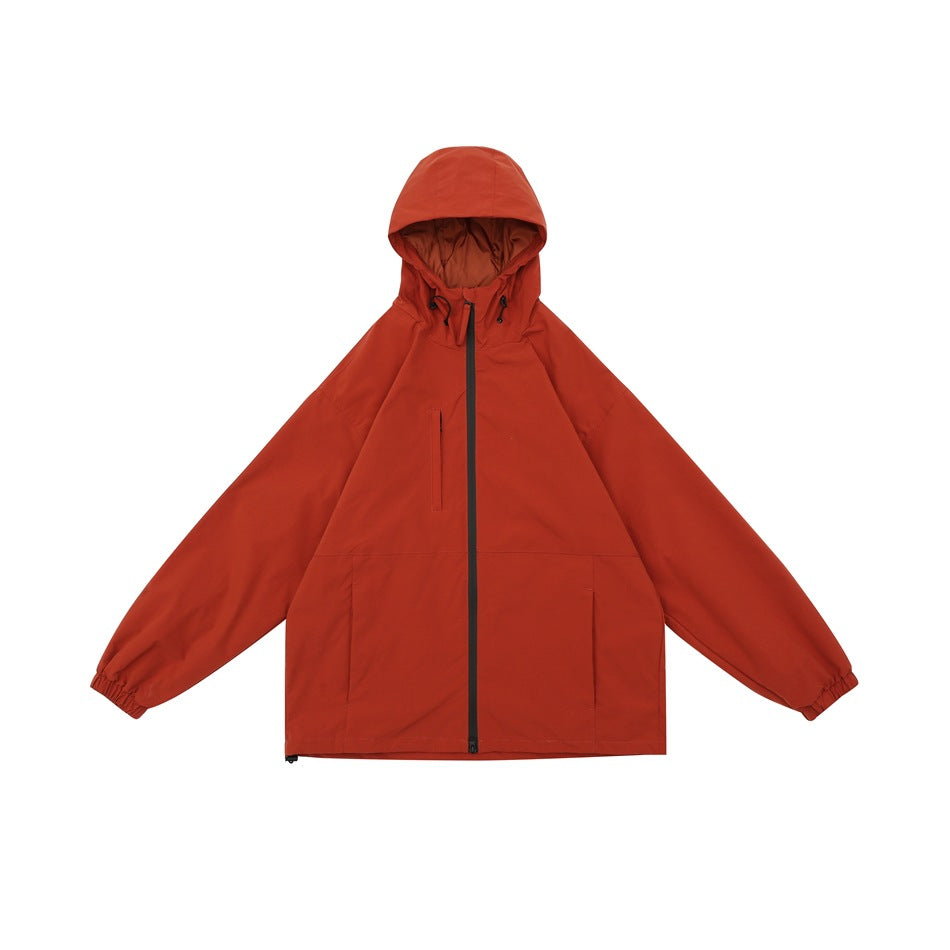 Front view of a rust-red hooded jacket with a black full-length zipper, drawcord hood and front pockets.