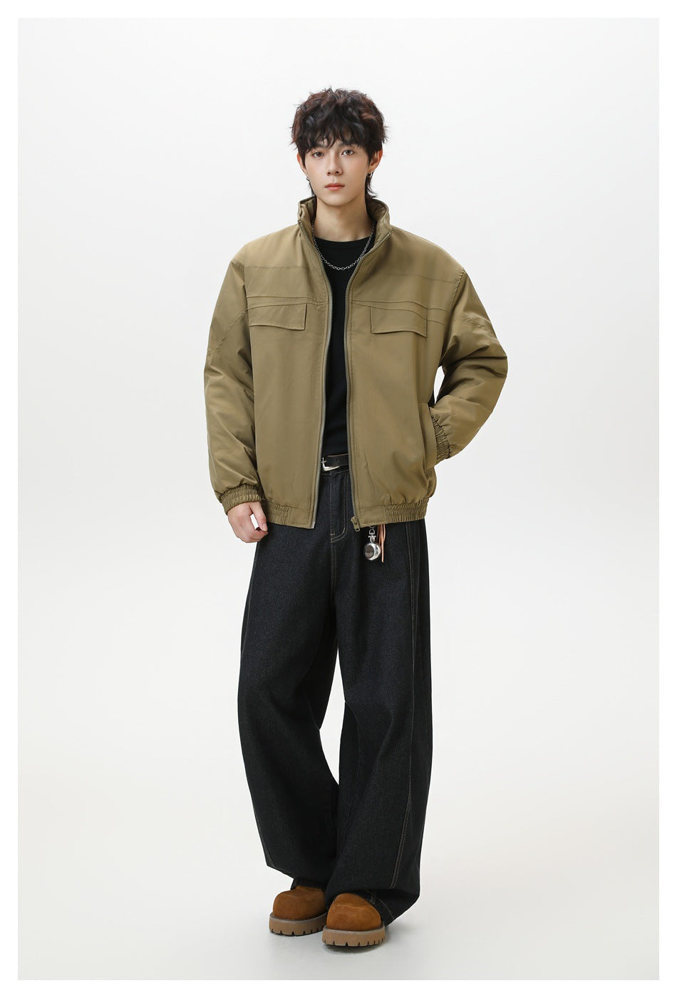 Model wearing an olive-brown zip jacket with a stand collar, flap chest pockets, elastic cuffs and hem.
