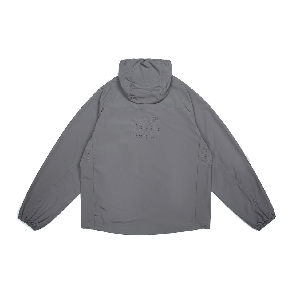 Back view of a gray hooded jacket laid flat, with long sleeves, elastic cuffs, and perforated ventilation panels.