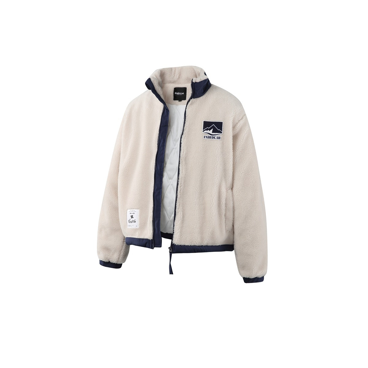 Beige fleece jacket with navy trim unzipped, showing white quilted interior and chest mountain patch